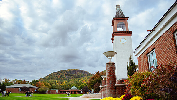 Students walk across the Mount Carmel Campus Quad.