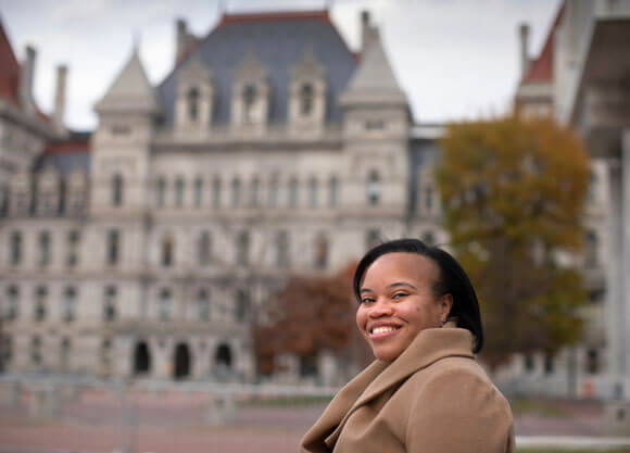 Stacy Lynch outside the New York State Capitol building