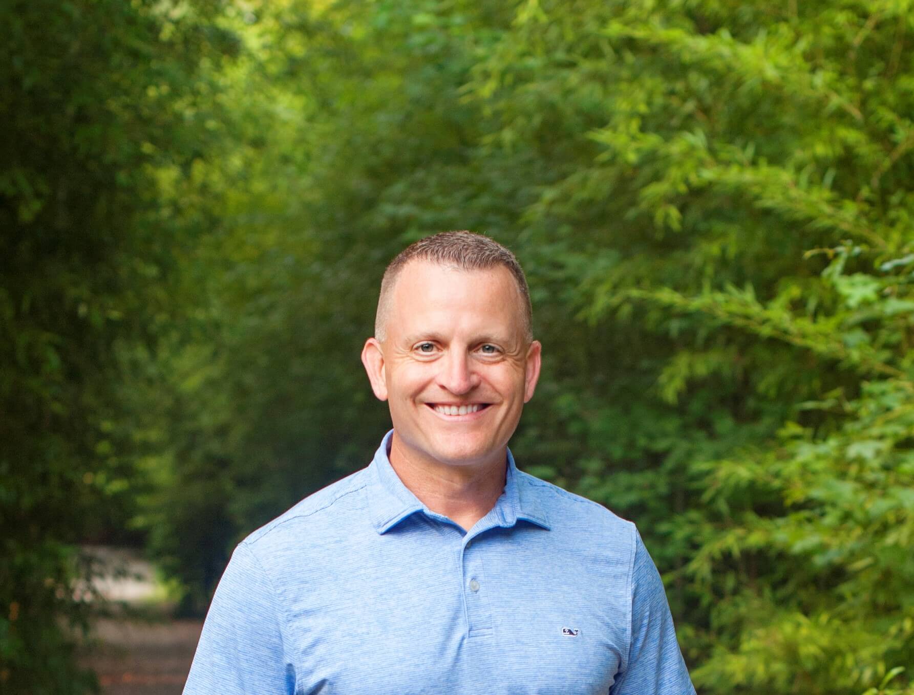 David Pohorence smiles outside on a sunny day