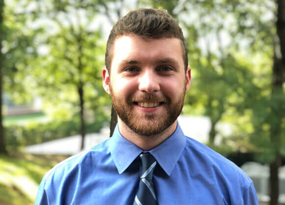 Kyle Del Balso smiling in headshot