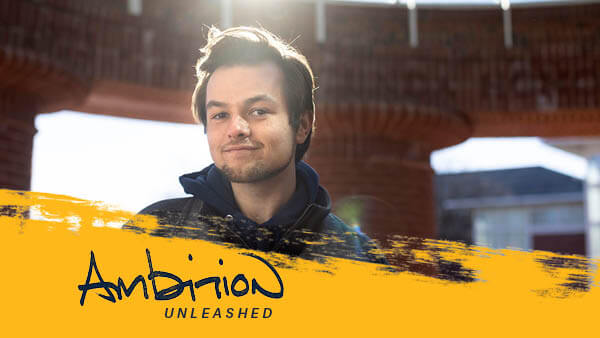 Jack stands outside on Quinnipiac's Mount Carmel Campus