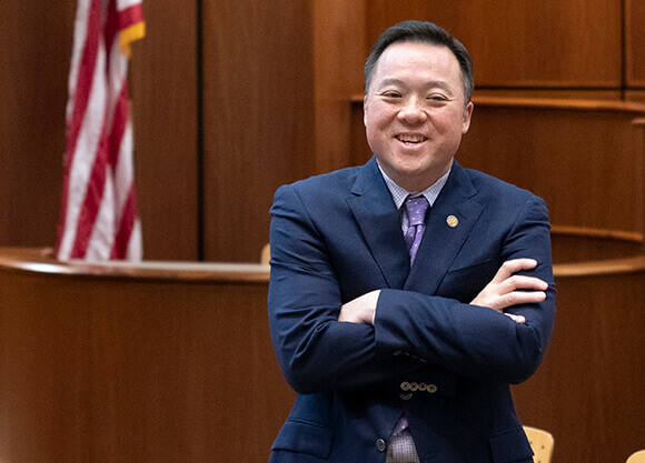 Shot of William Tong standing