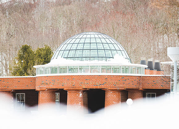 School of Business with snow on the roof.