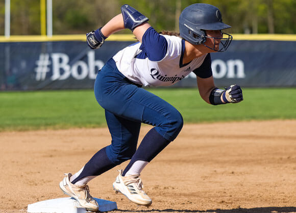 Softball player on the bases at Quinnipiac University