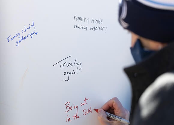 Student signs wall of hope