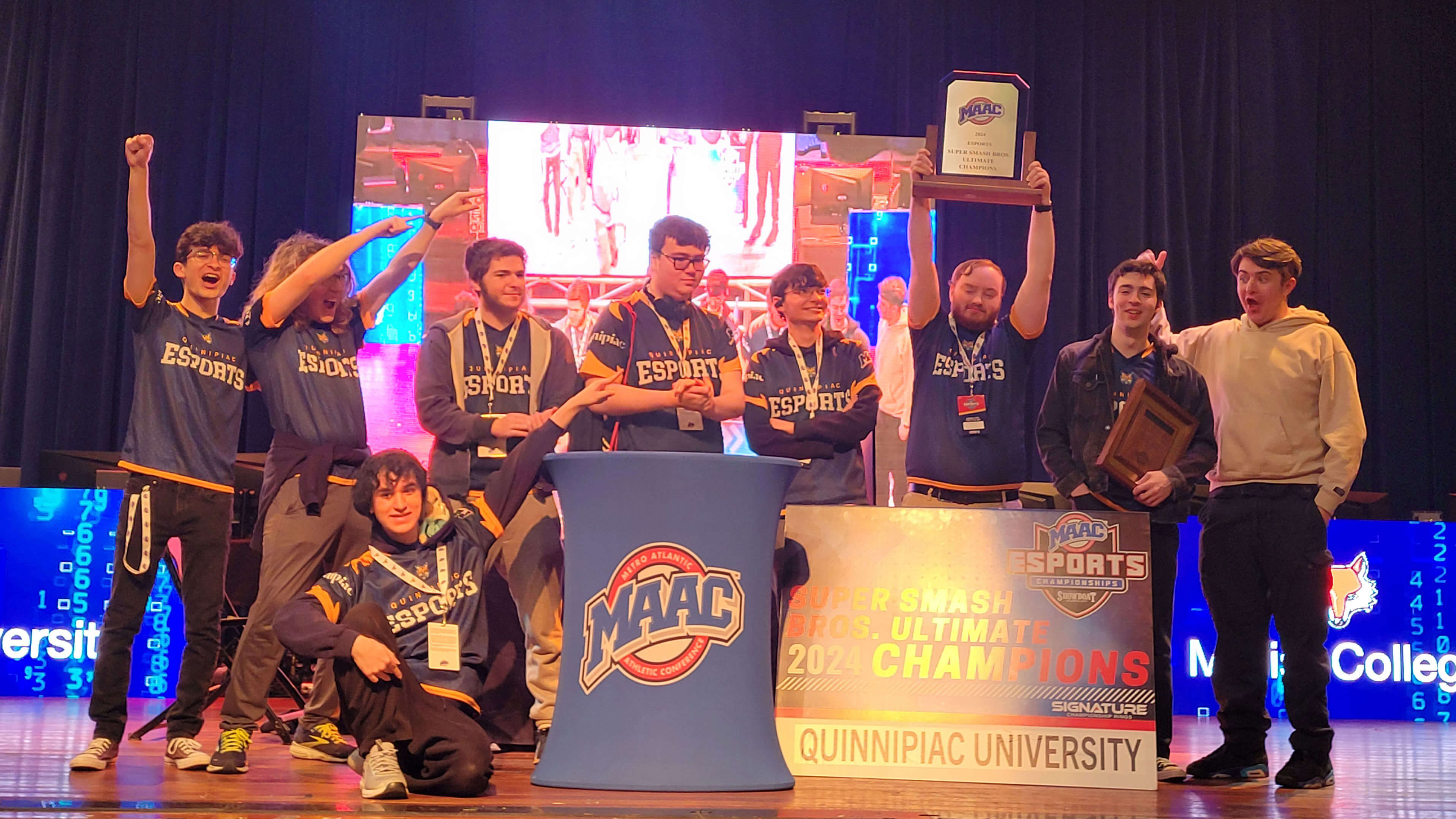 Esports club smiling with the MAAC Super Smash Bros. Ultimate 2024 Champions sign