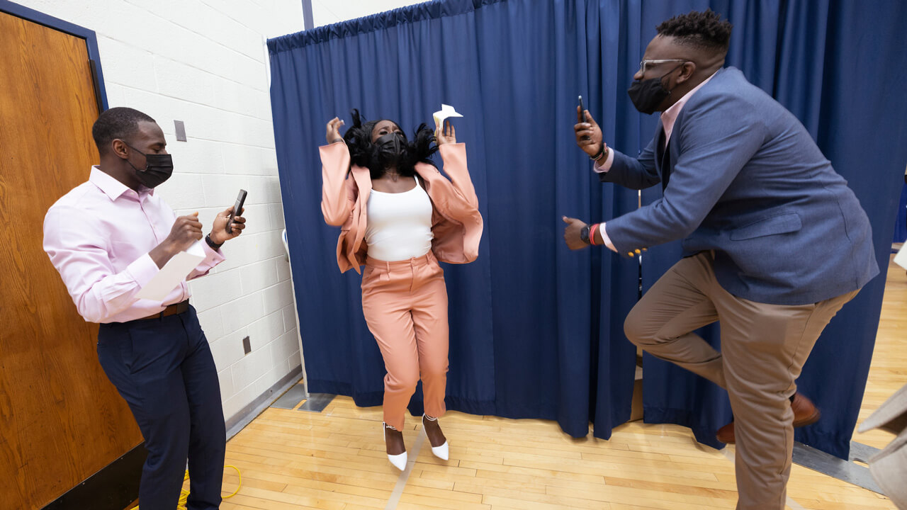 Linda Kerandi and her family jump up in celebration during Match Day