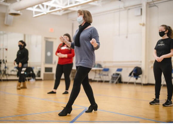 Students participate in ballroom dancing