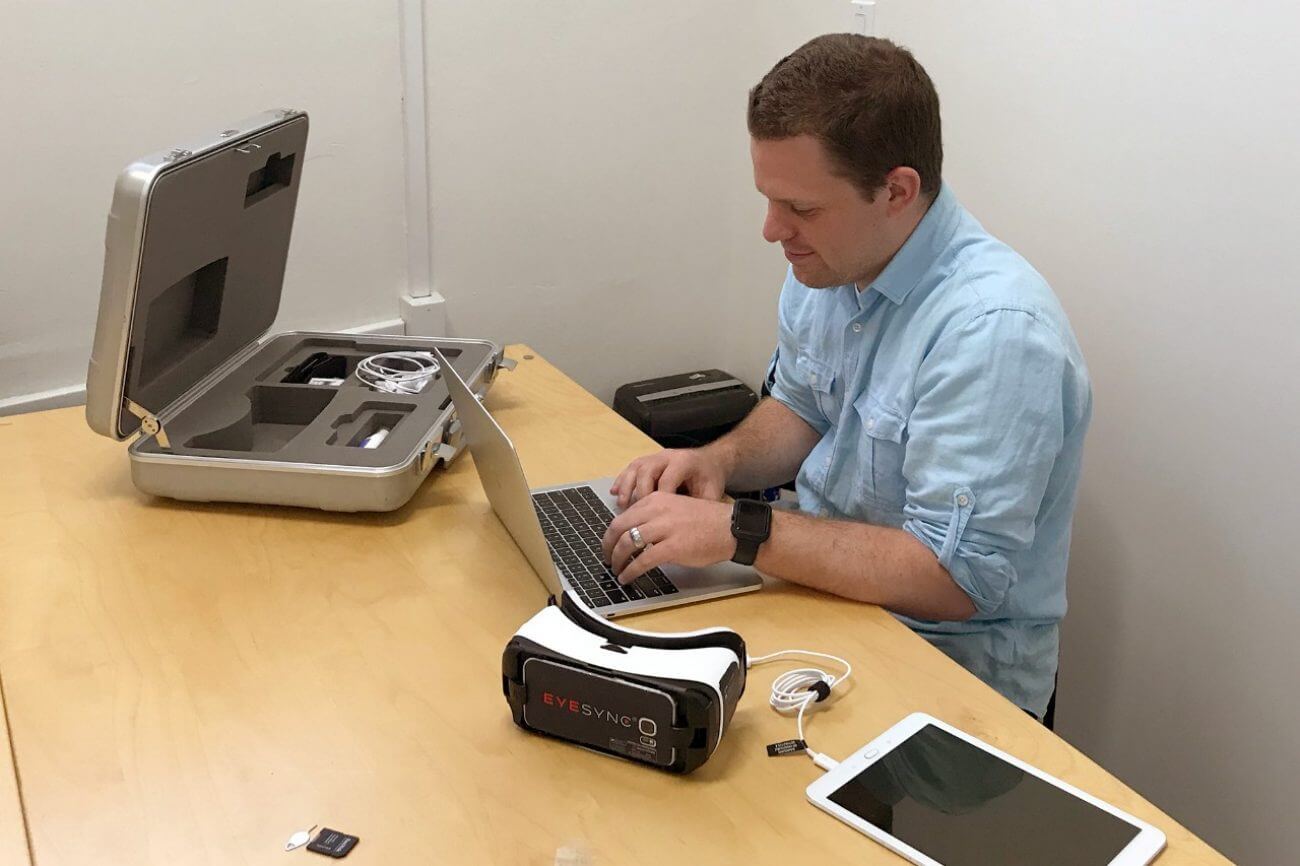 Matt Mills '11 works on virtual reality technology.