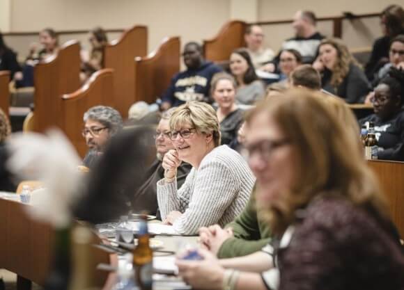 A crowd of people at auction