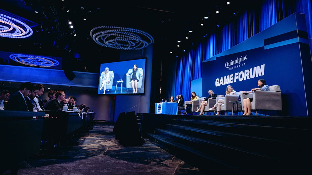 Photo of the crowd looking at the stage at GAME Forum.