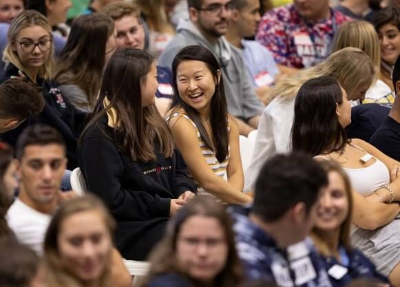 Students sit in seats during Welcome Weekend