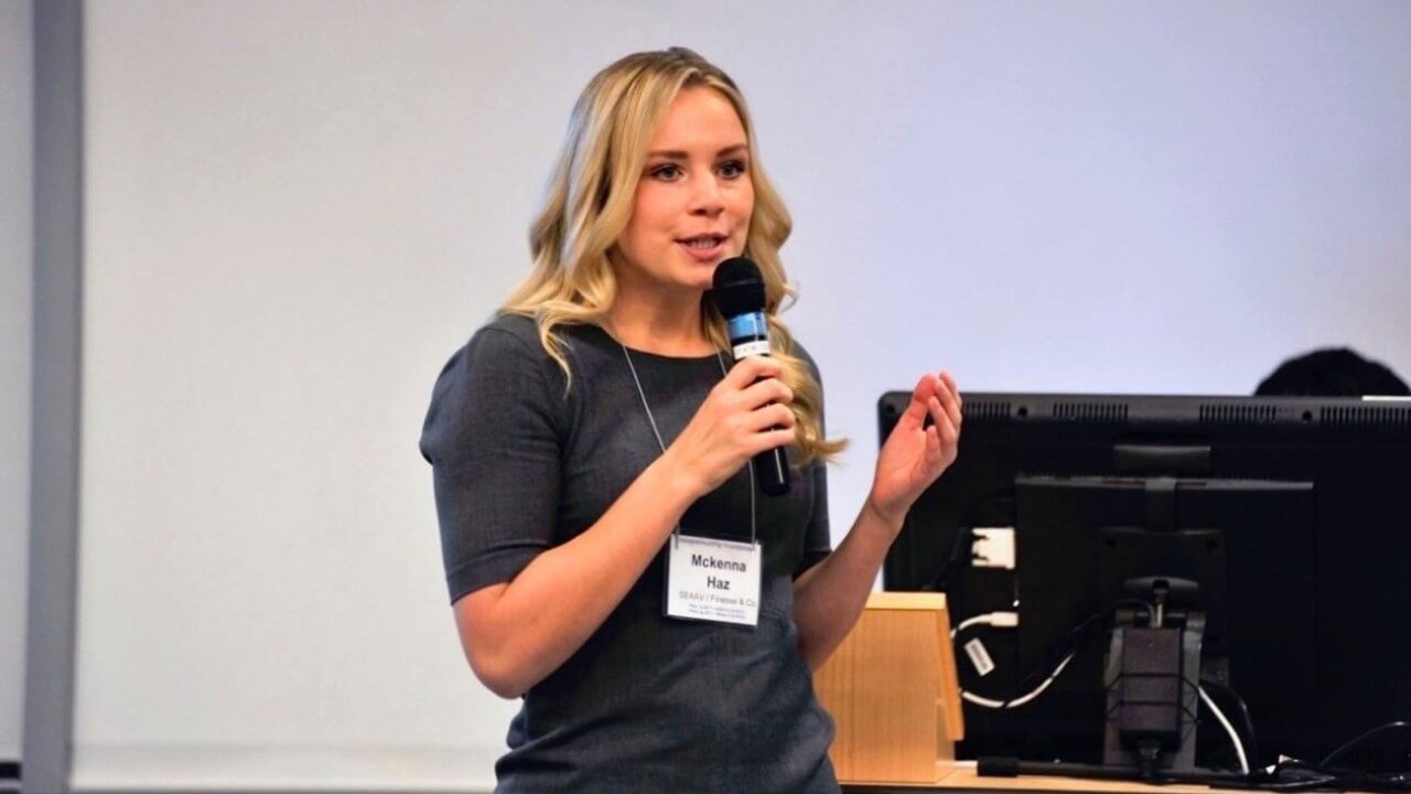 Mckenna Haz speaking into microphone