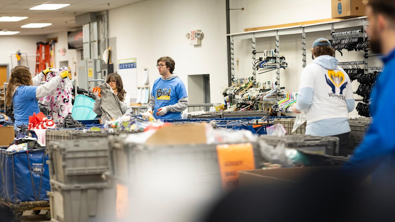 People sorting clothes