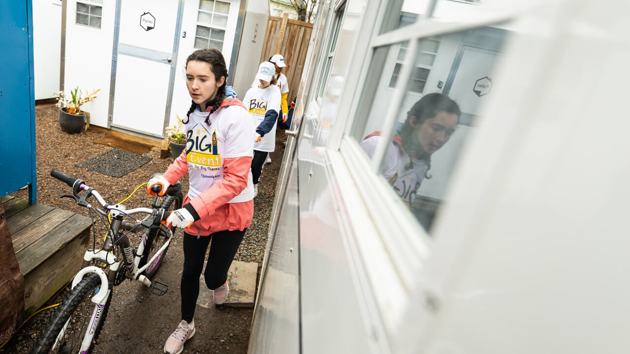 People moving bicycles