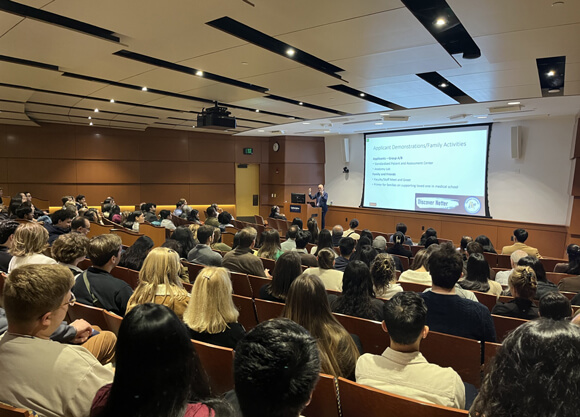 Students sitting in an auditorium