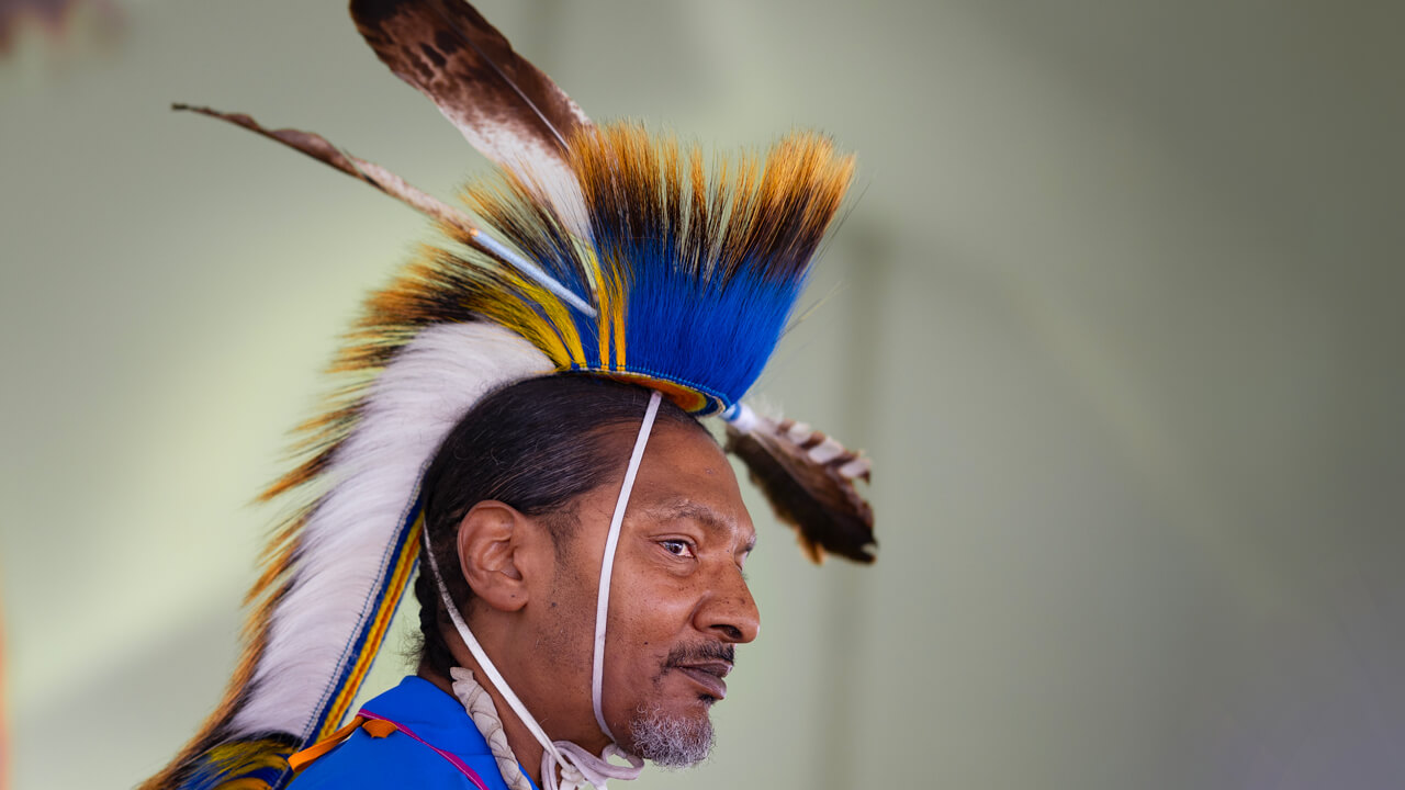 Close up of an individual participating in the powwow