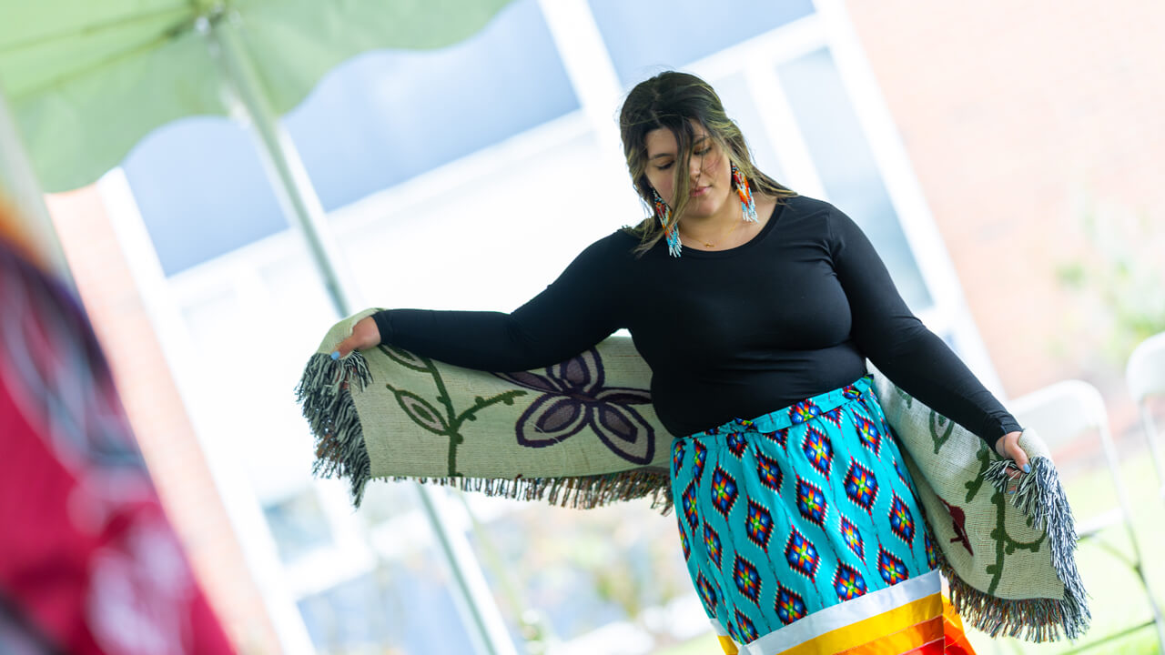 Individual participating in the powwow