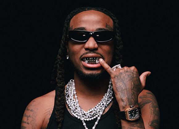 Headshot of rapper and singer, Quavo.