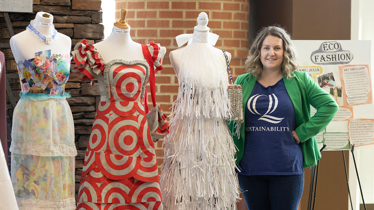 Students show off their dresses made from target bags, newspaper, and coffee filters
