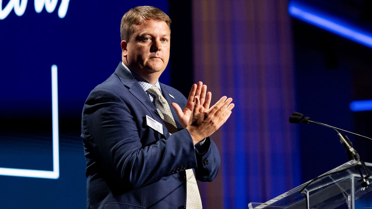 Nick Wormley stands and claps