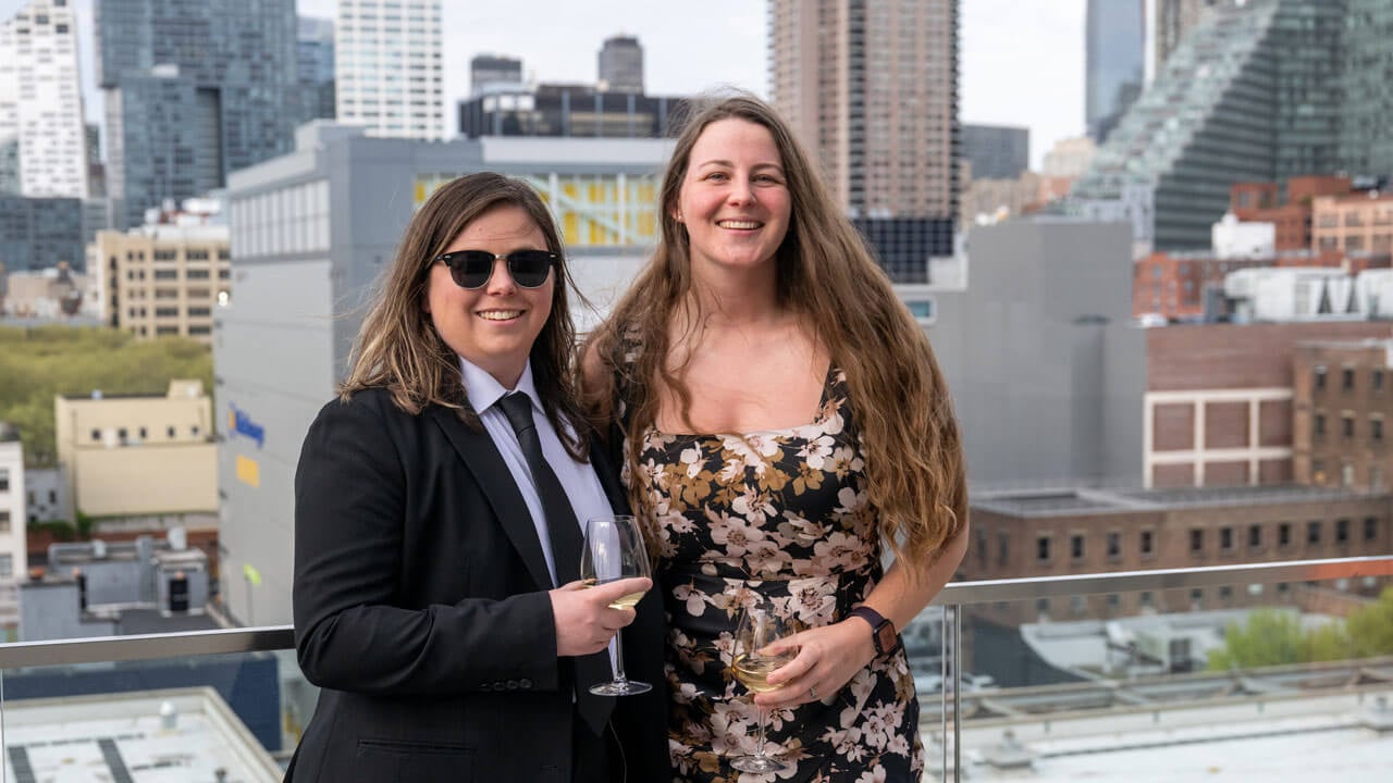 Two people pose for a photo