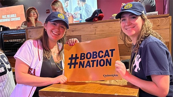 Quinnipiac alumni at a pregame event outside of Fenway Park