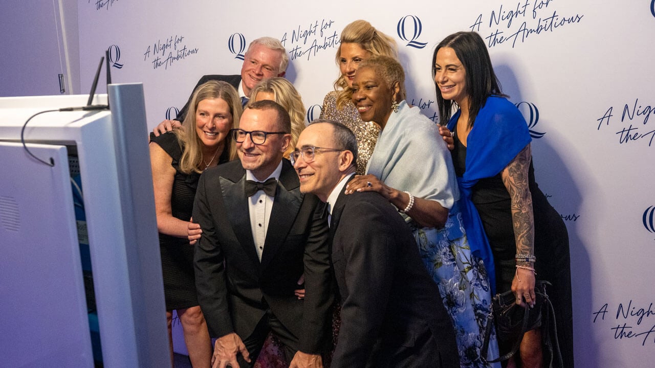 People taking a photo at the photobooth