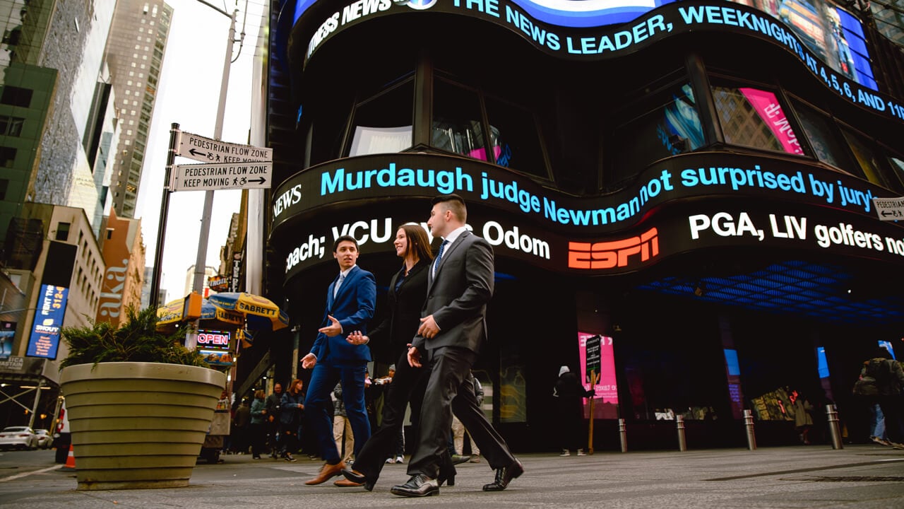 Quinnipiac students exploring New York City in business attire during GAME Forum.