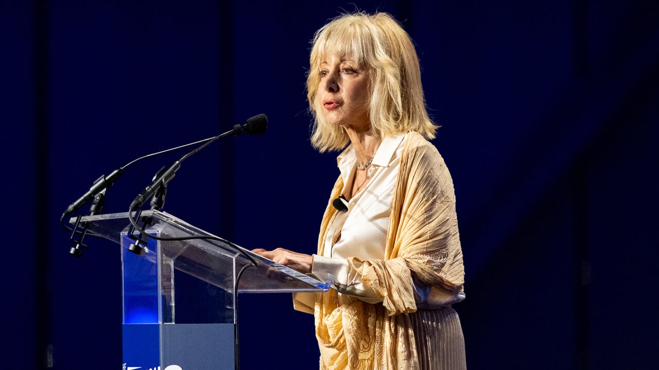 President Olian speaks at a podium