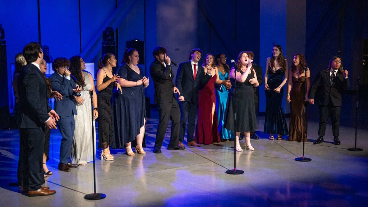 People singing on stage