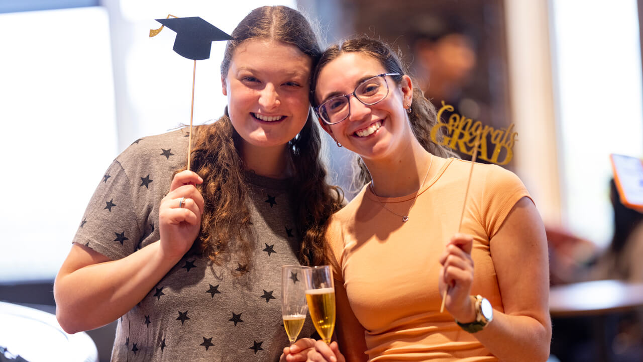 Two students pose together