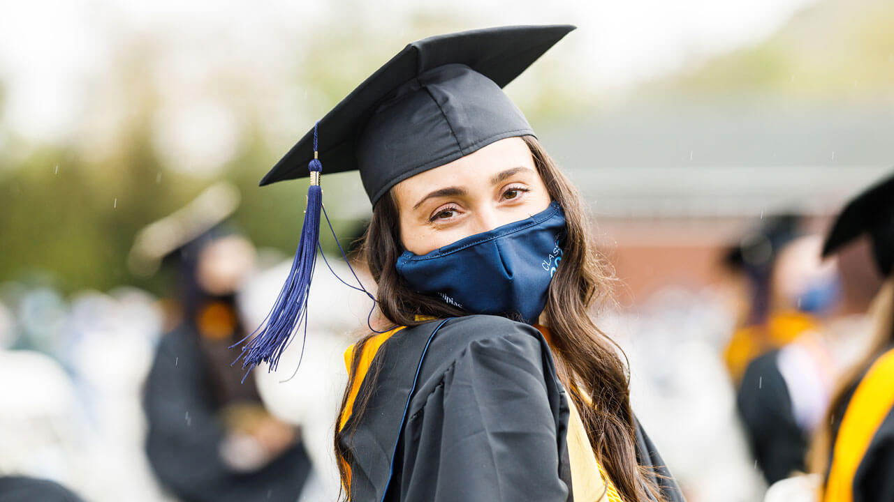Nursing graduate smiling at camera