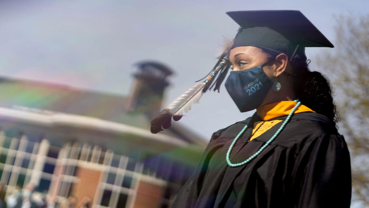Feather attached to girl's cap