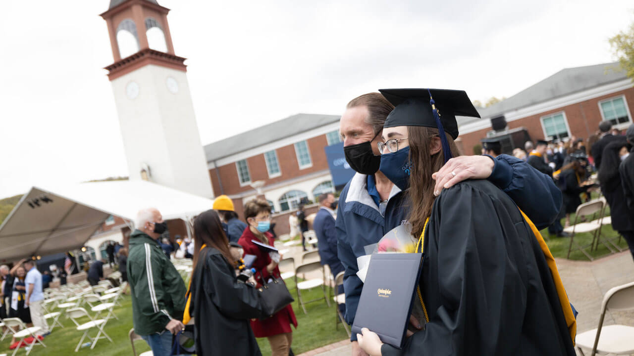 Father and daughter take photo together after ceremony