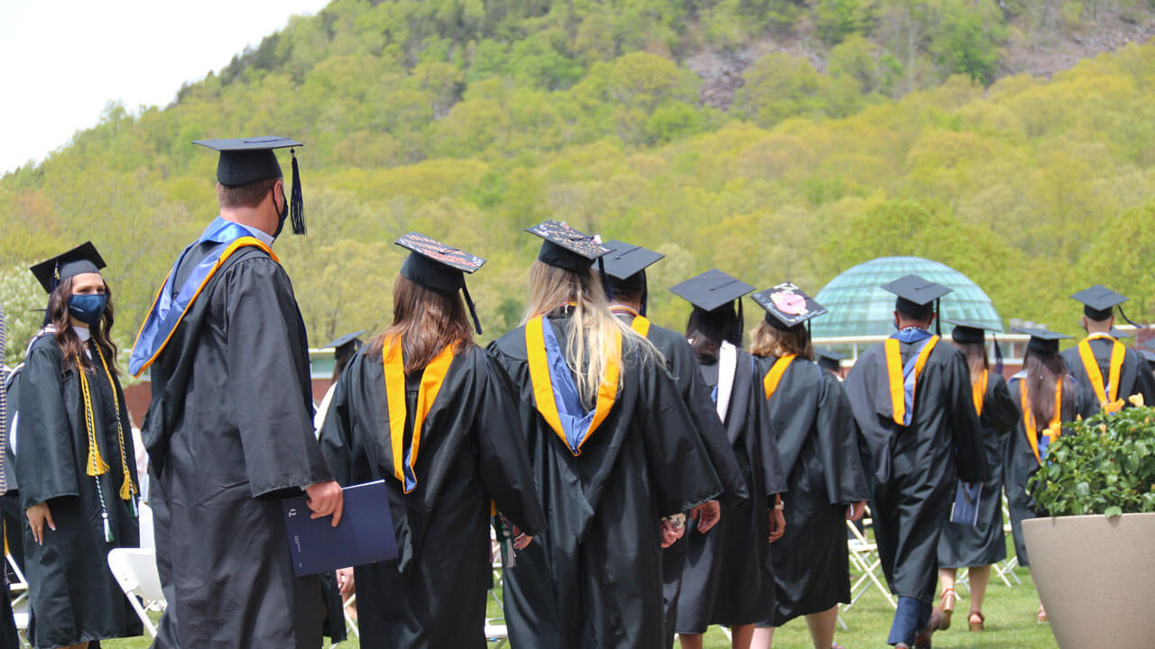 Students walking towards school of business