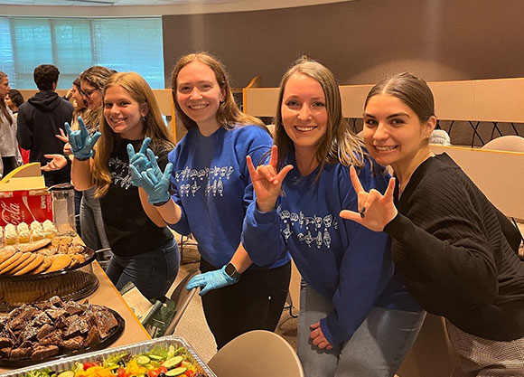 Students in the American Sign Language Club