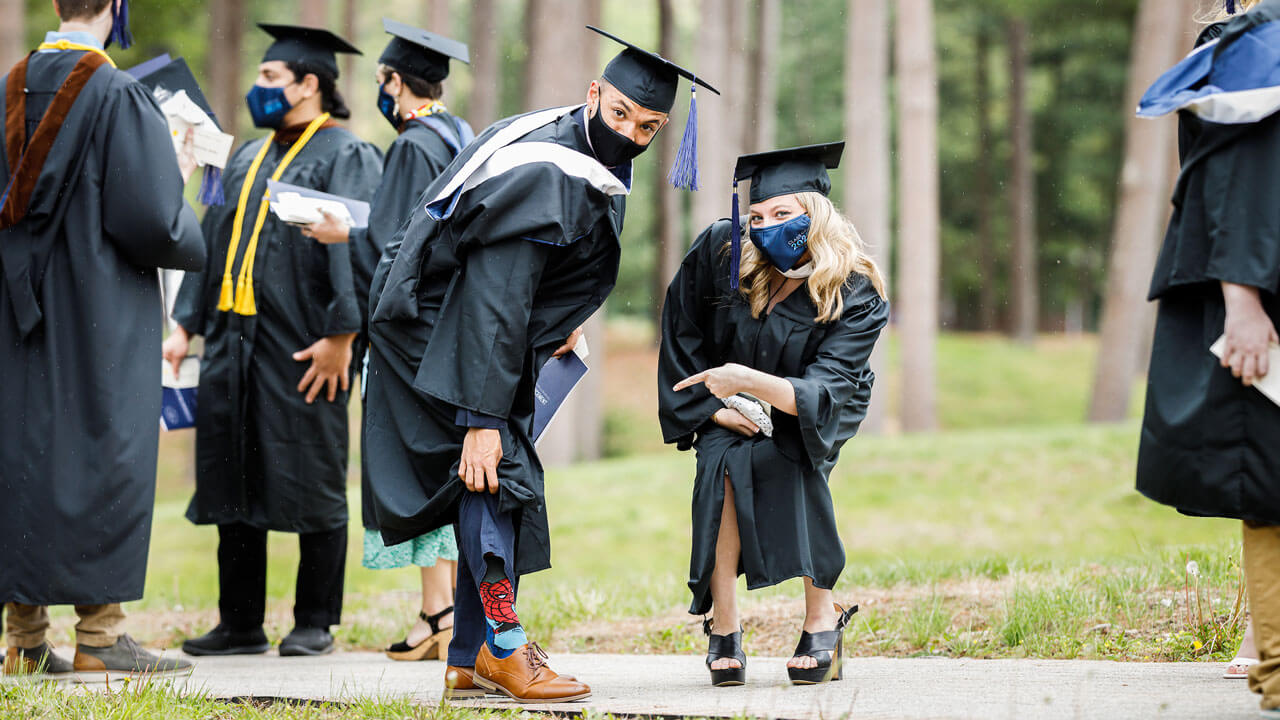 Student showing off spider man socks