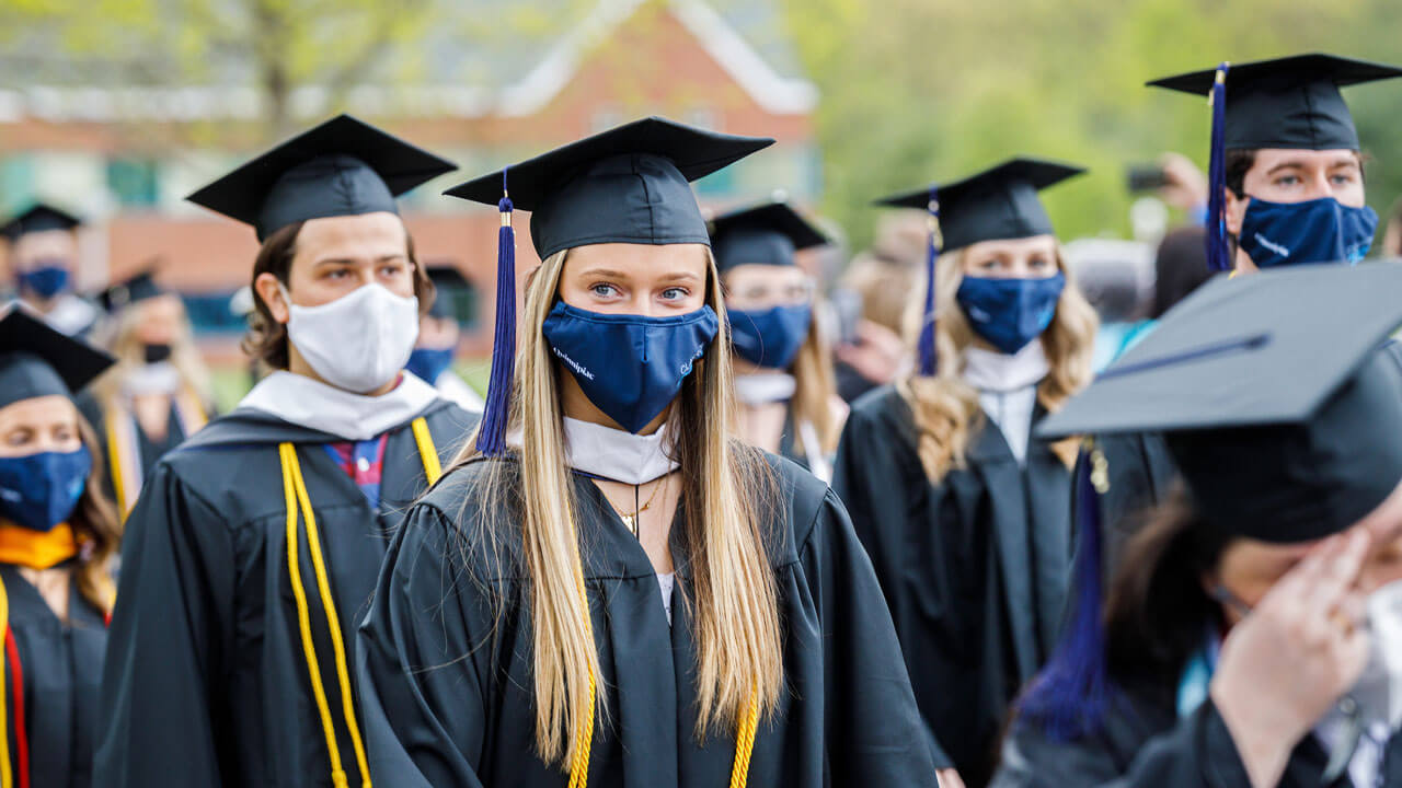 Students standing during ceremony
