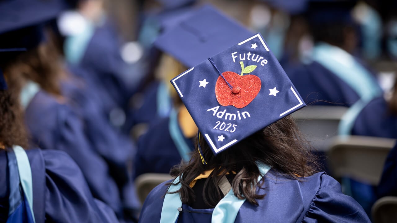 Cap that says "Future Admin 2025"