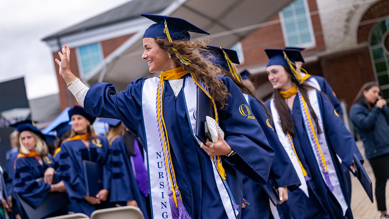 Female nursing student in cap and gown.