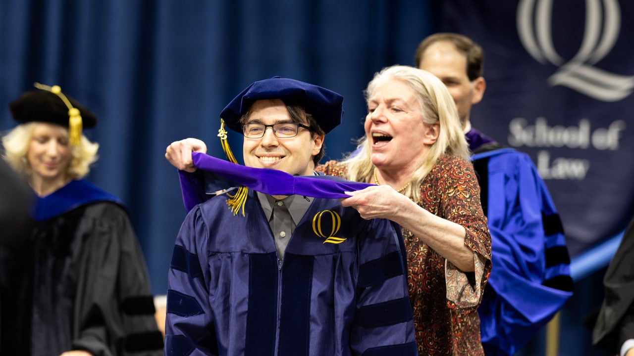 Graduate gets hooded