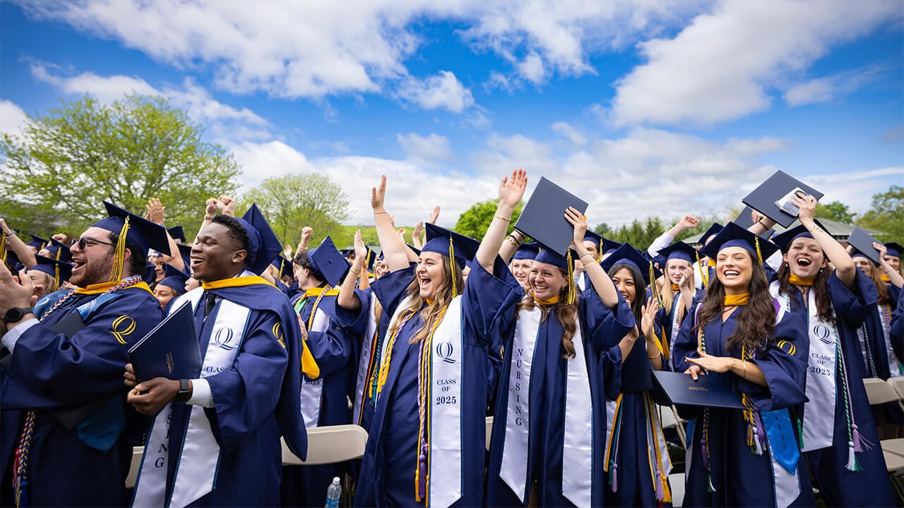 Class of 2025 students cheer at commencement.