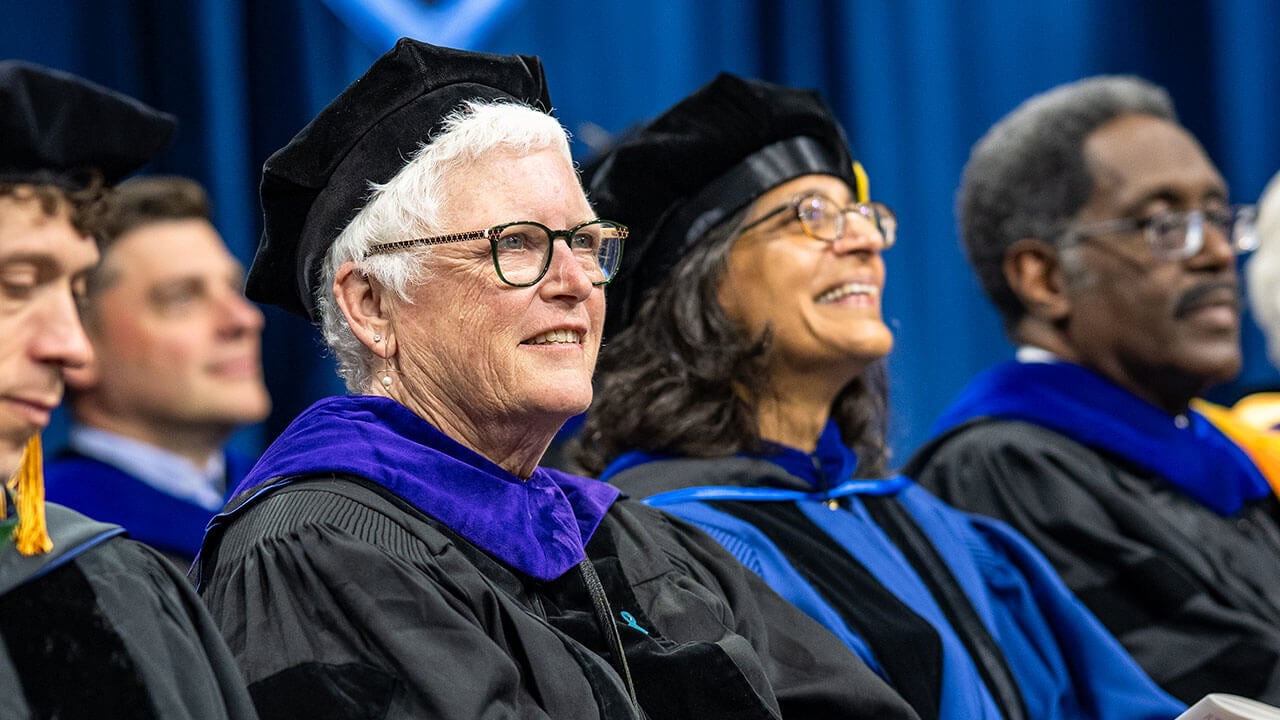 Platform Party smiles from the stage