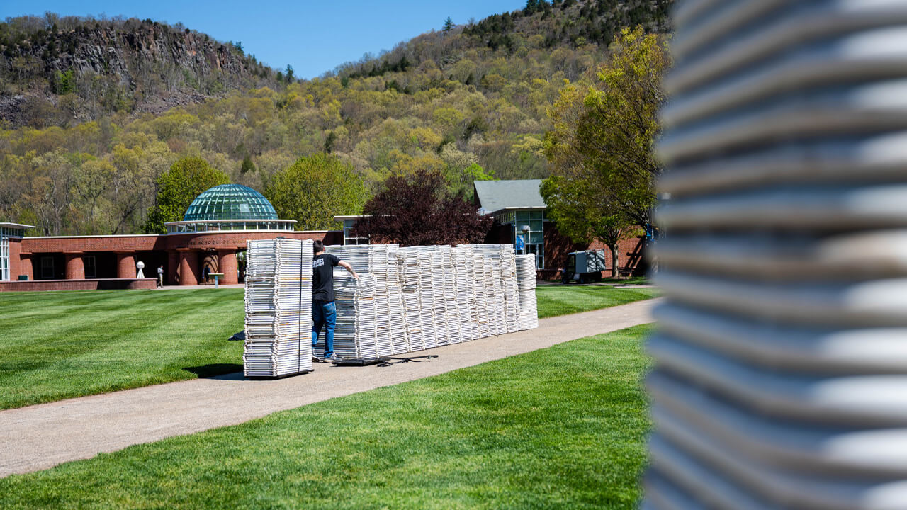 Chairs are stacked on the Quad.
