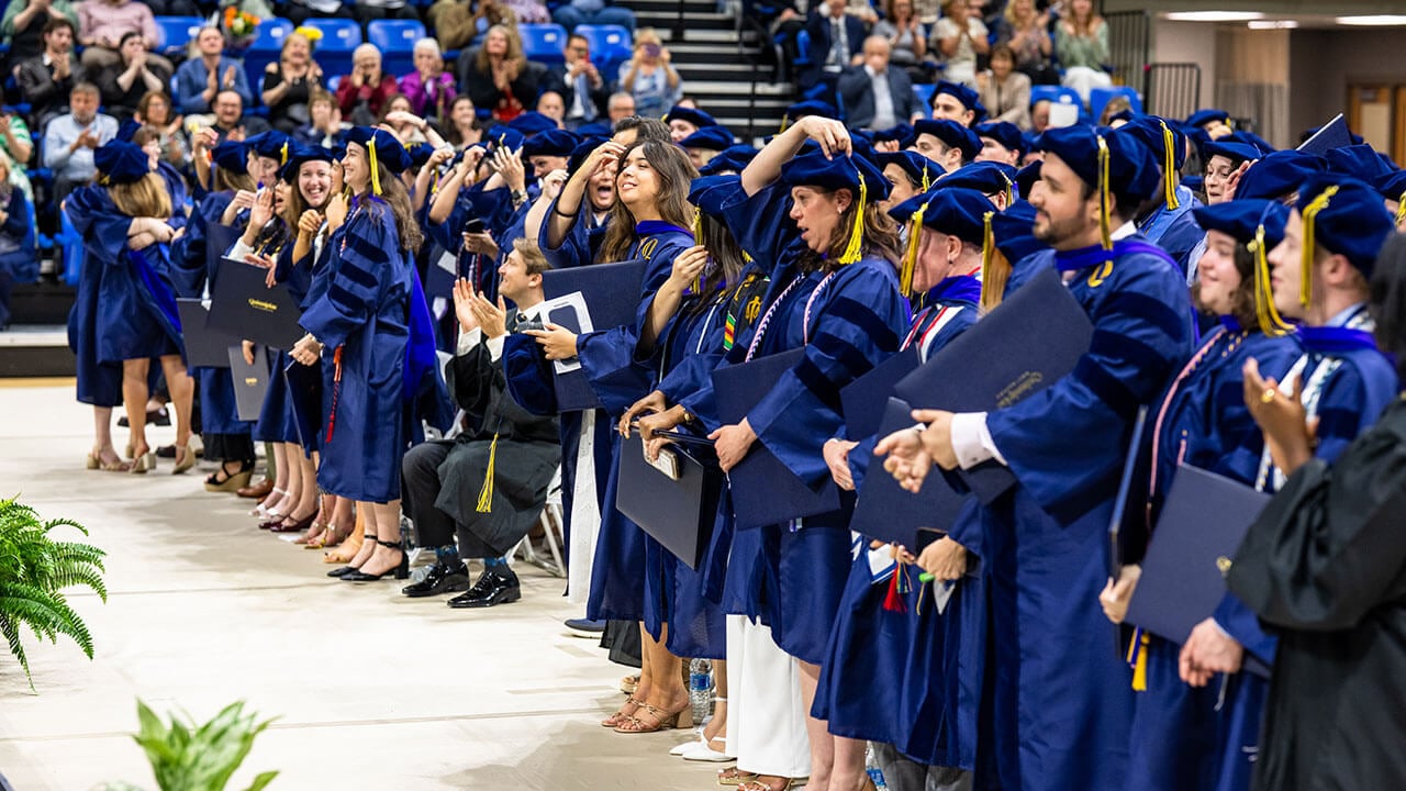 School of Law graduates switch their tassels