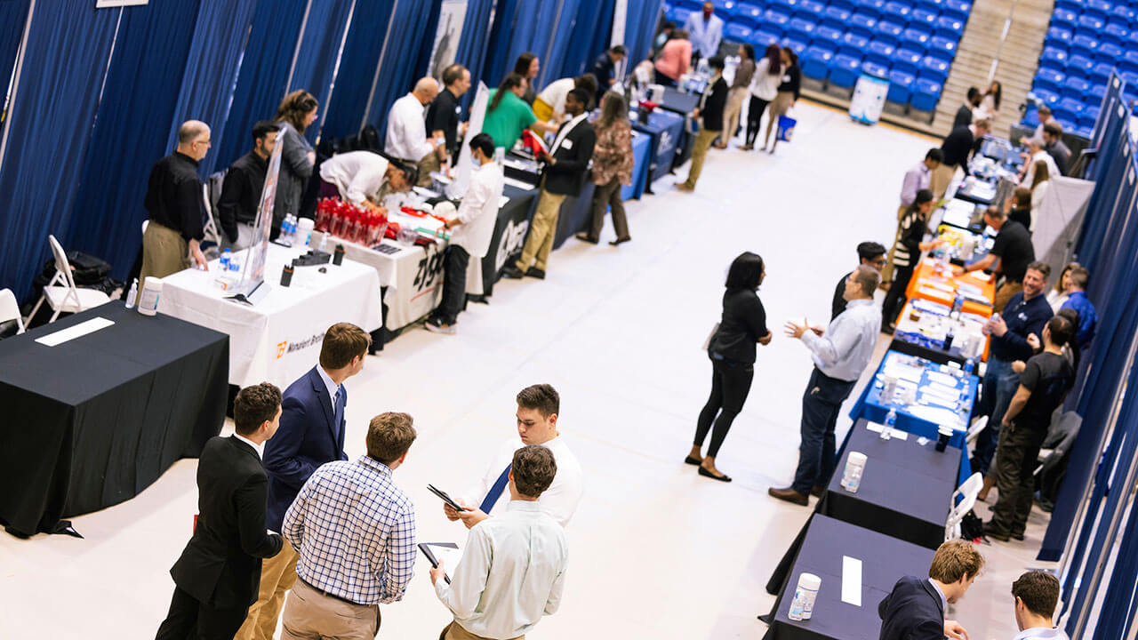 Students table at a fair