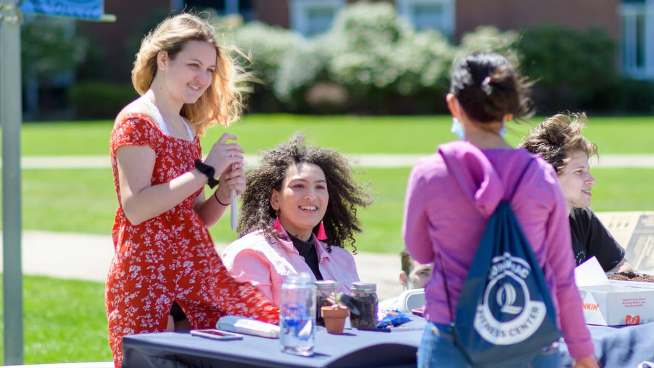 Students table on the quad for Earth Day