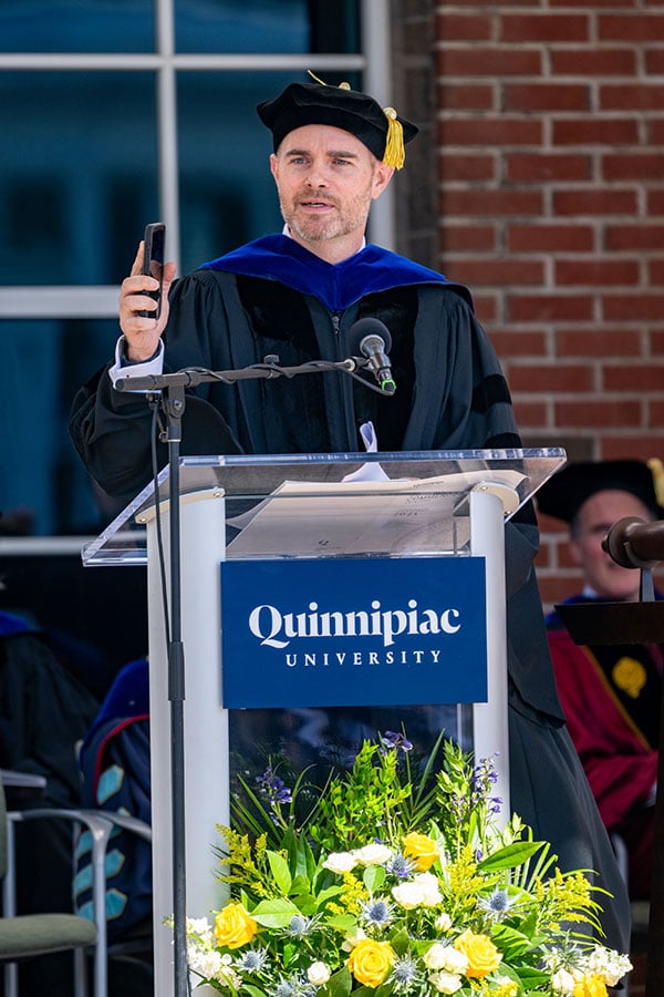 Eric Marrapodi '03, Vice President, News Programming, NPR, addresses the graduates