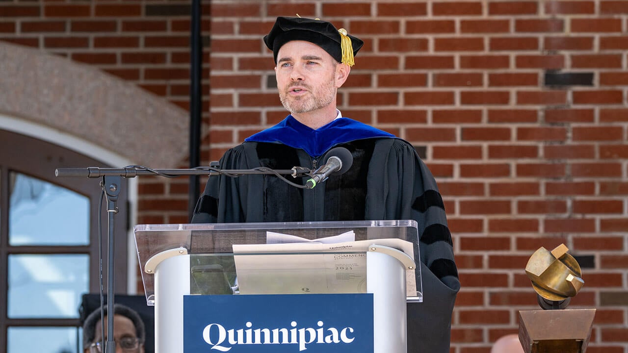 Eric Marrapodi '03, Vice President, News Programming, NPR, addresses the graduates